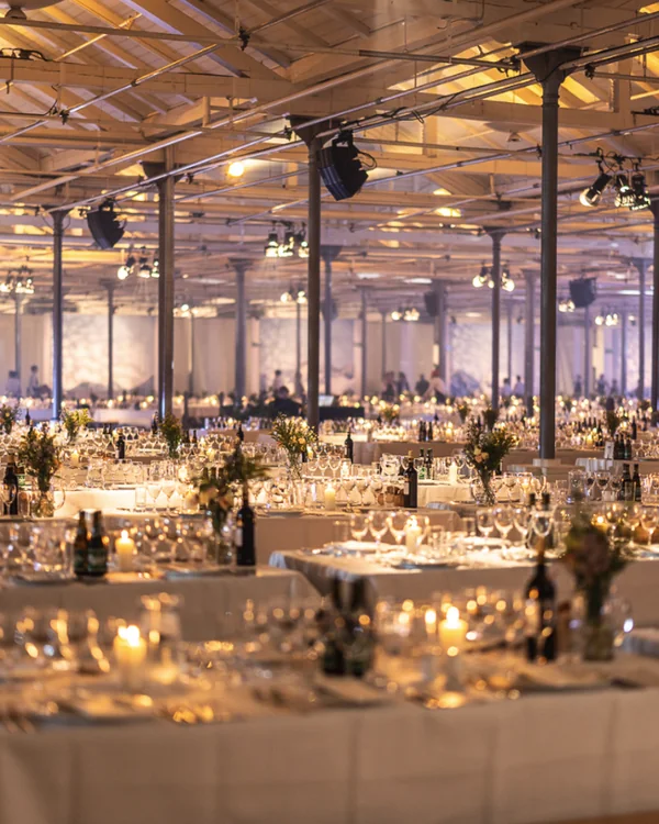 A candlelit dinner for hundreds in the old cattle market hall
